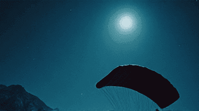 Night Wingsuit Flying: Navigating Mountain Passes in Complete Darkness